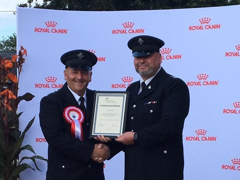 David receiving his accreditation at a Royal Canin event.